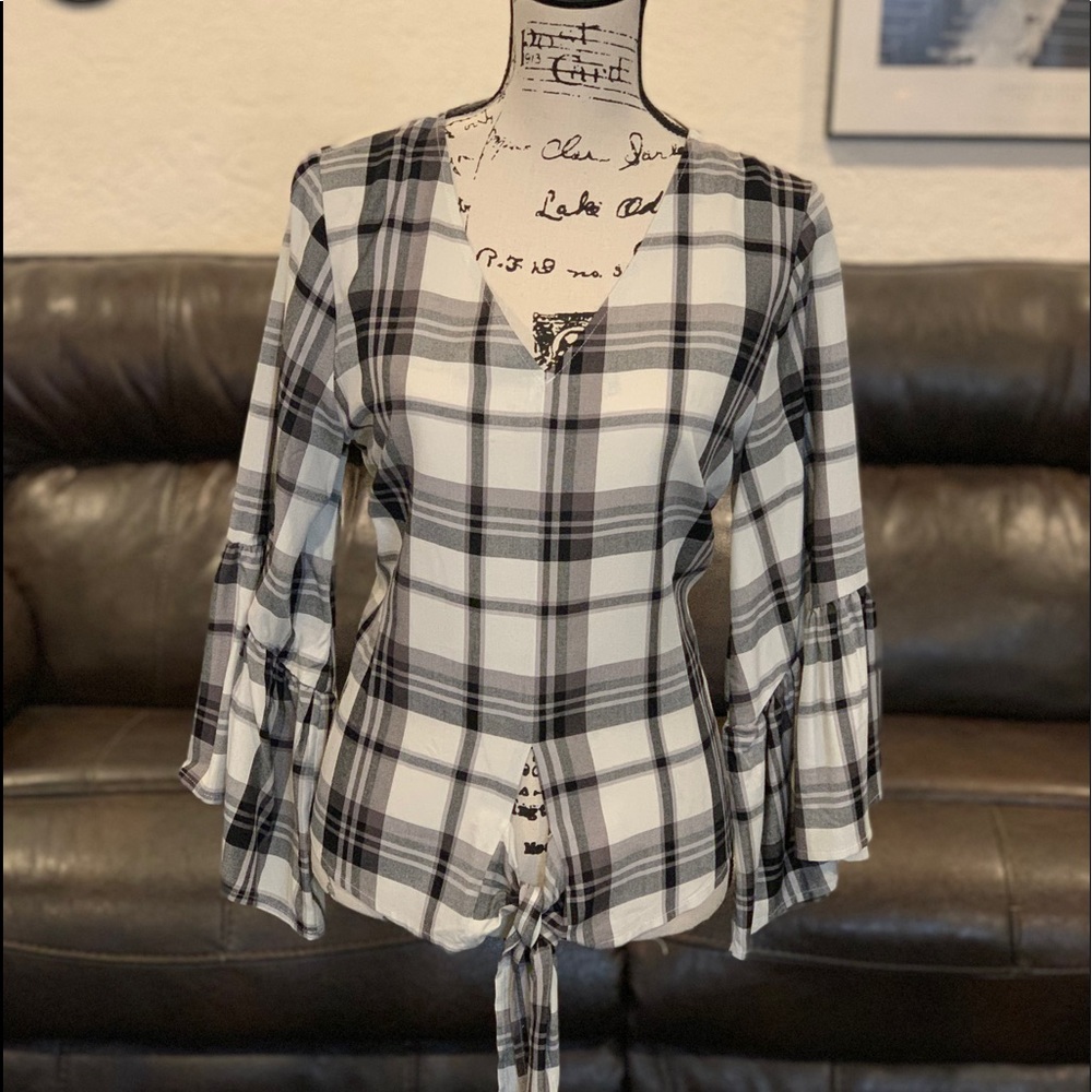 Black and white checkered top with ruffled sleeves